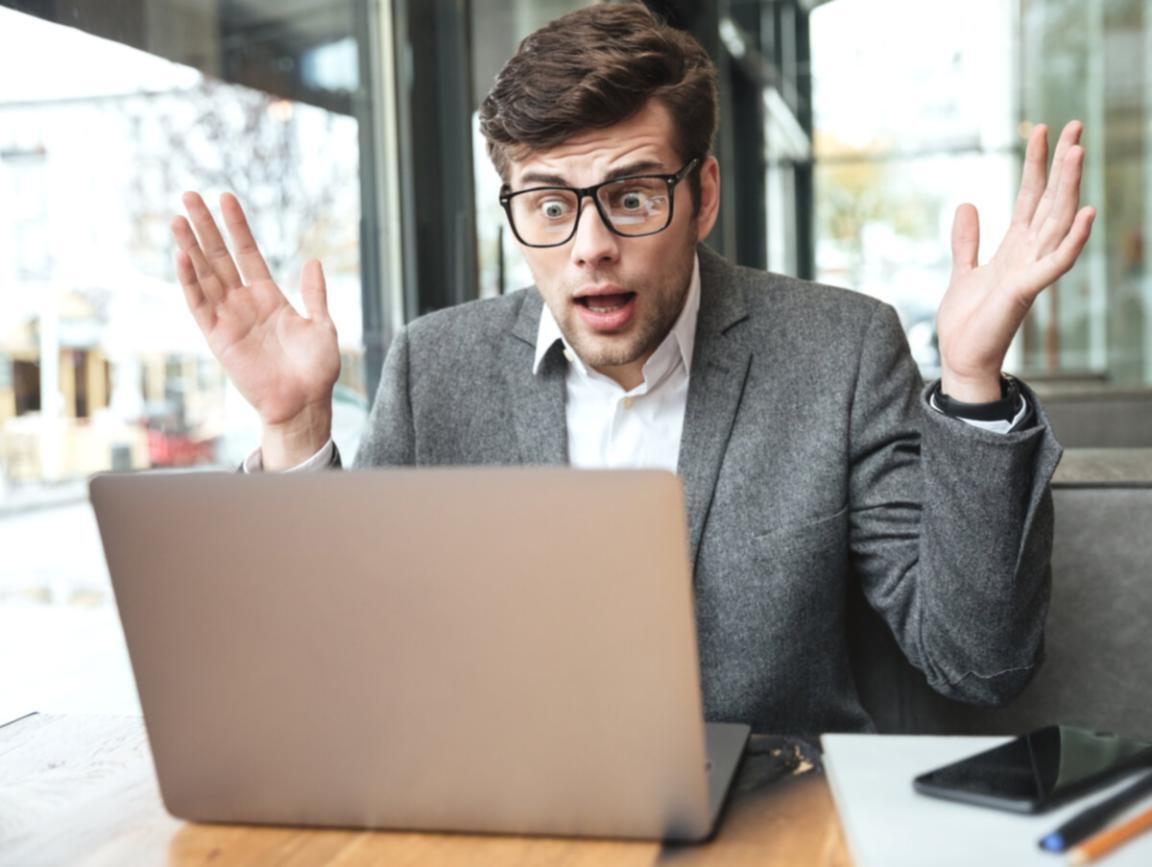 Business owner reviewing financial statements and budget allocations
